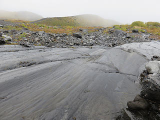 Glacially-smoothed Nooksack rock. Upper part of the Hogback in background.